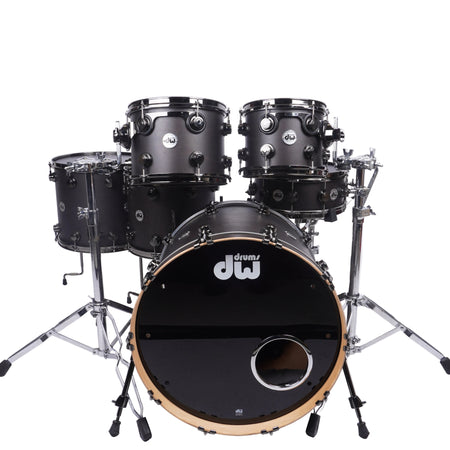 A DW drum kit with a black gloss finish and natural wood rims, displayed on a white studio background.