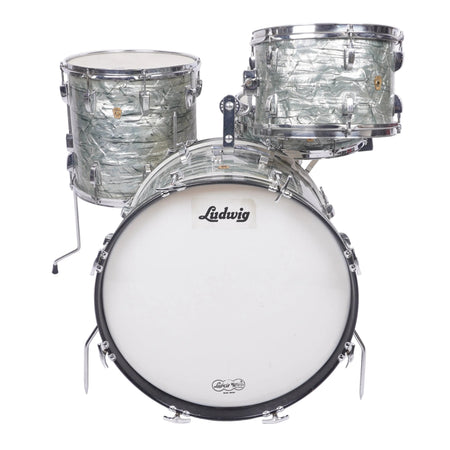 A Ludwig drum kit with a white bass drum, two silver marbled tom drums, and chrome hardware, photographed against a plain white studio background.