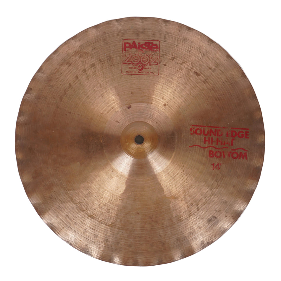 A single Paksa 2902 Sound Edge Hi-Hat Bottom 14" cymbal, showing its metallic gold-bronze finish with red printed brand and model markings, photographed against a plain off-white background.