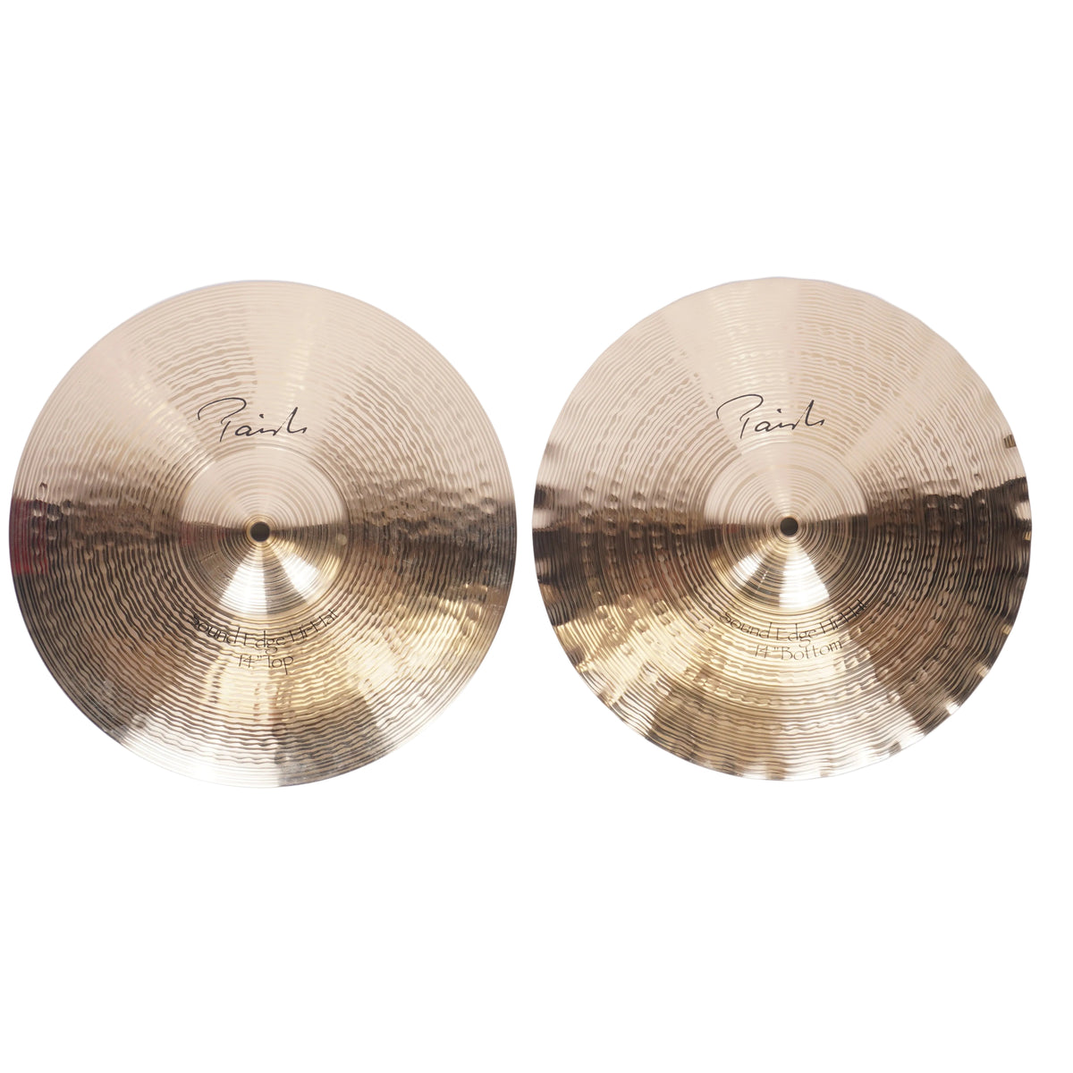 Two Paal cymbals with a hammered gold finish, displayed side-by-side on a light off-white background.