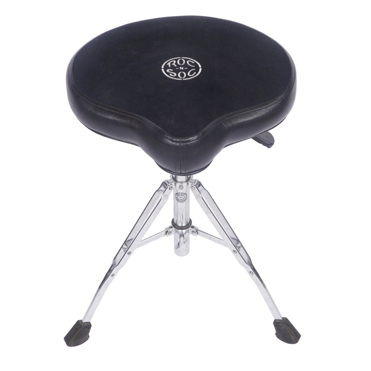 A black drum throne seat with a silver metal tripod base, featuring a circular silver logo on the center of the cushion, photographed against a white studio background.
