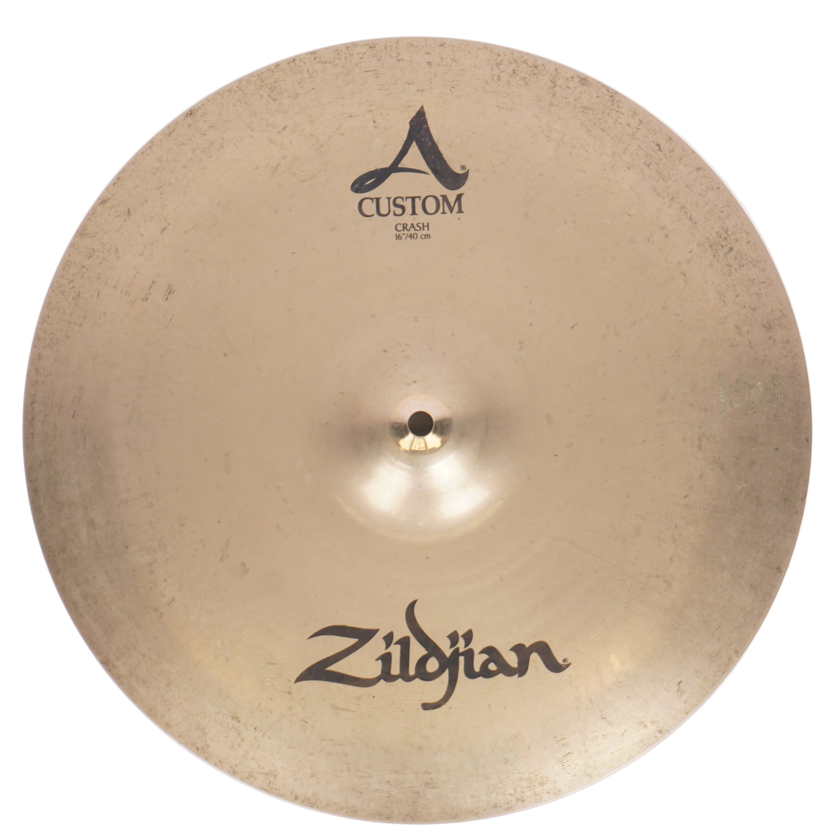 A Zildjian Custom A 16" crash cymbal with a warm gold-bronze metallic finish, featuring the Zildjian logo at the bottom and the Custom A 16" text at the top, shown against a light textured background.